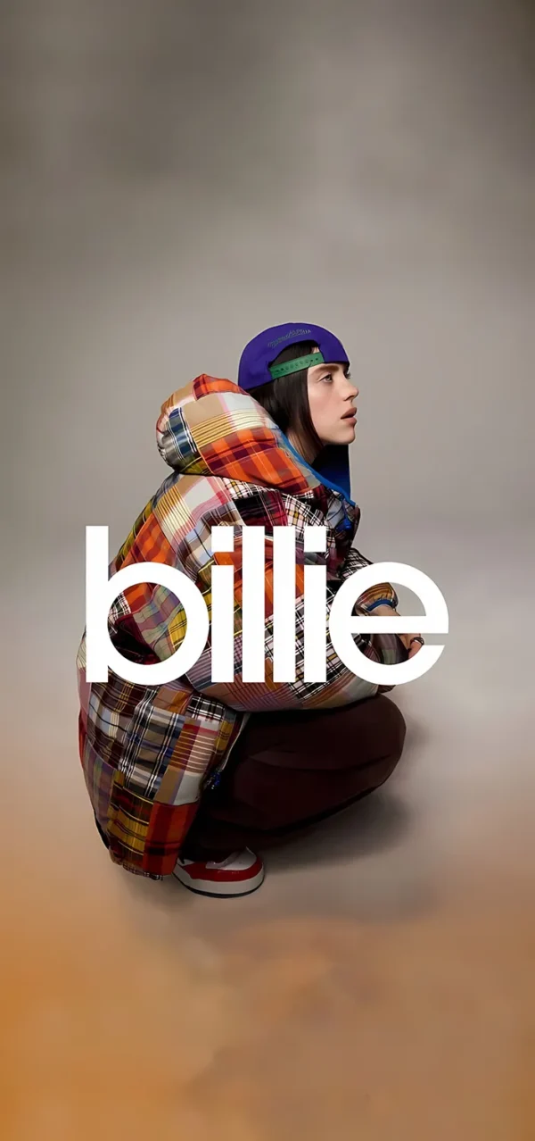 تصویر زمینه بیلی آیلیش با لباس‌های گشاد و اسپرت