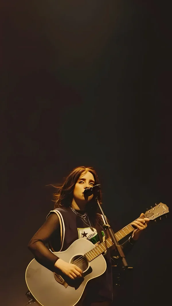 عکس پس زمینه بیلی آیلیش در حال اجرای زنده